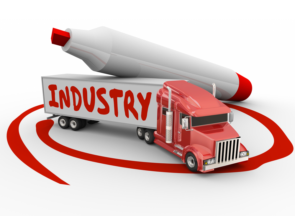 Semi-truck showing the word industry on the side circled in read with sharpie leaning on it. OTR Truck Driving Companies