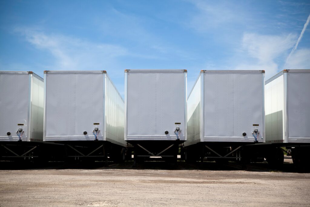 Semi truck trailers in a yard